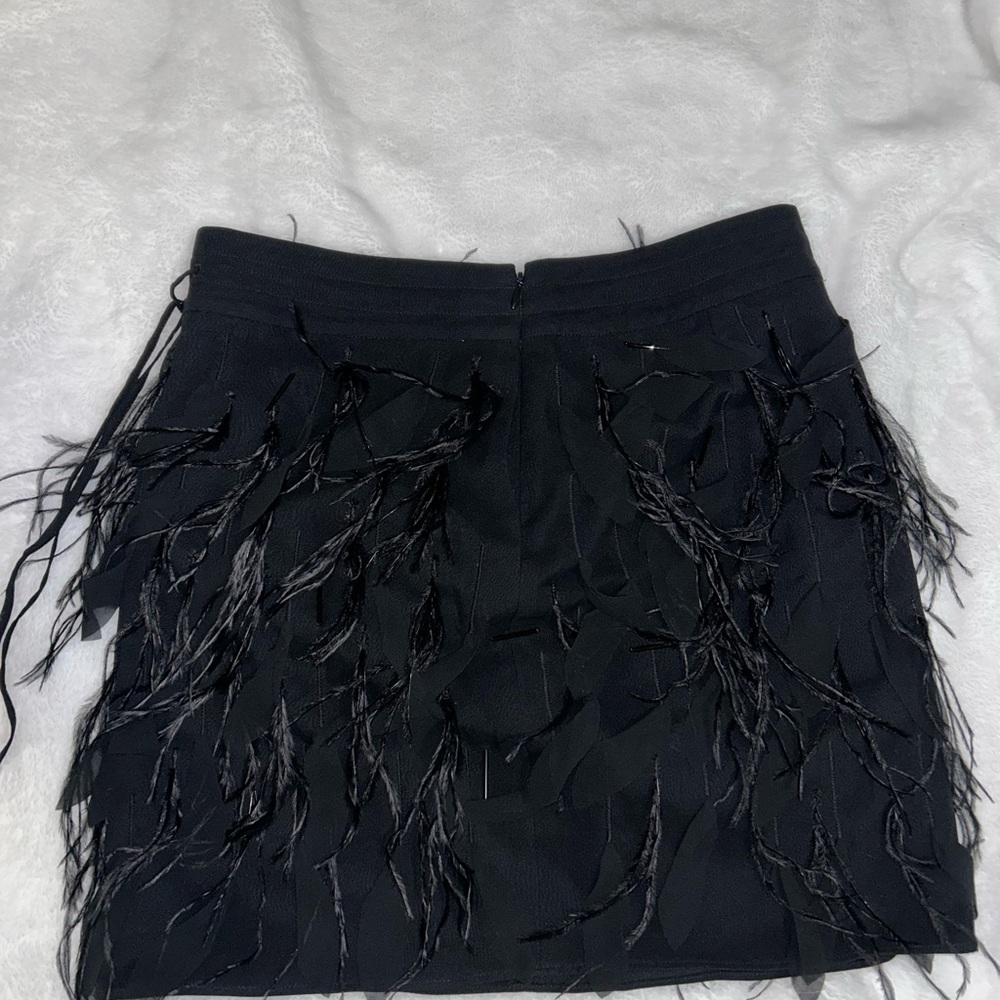 black (mini) skirt with feather like details with zipper in the back, 100% silk